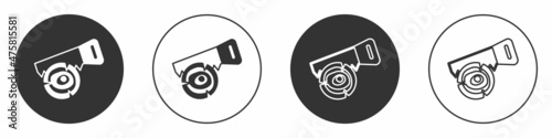 Black Hand saw and log icon isolated on white background. Circle button. Vector