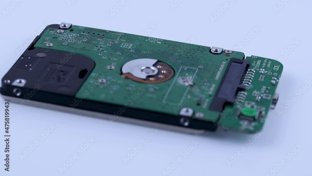 a large iron drill drills a hard disk, information destruction, soft focus, a large iron drill drills a hard disk, information destruction, soft focus,