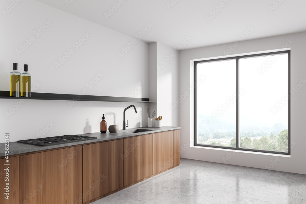Corner view on bright kitchen room interior with panoramic window