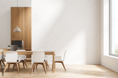 Bright office room interior with empty white wall  two desktops