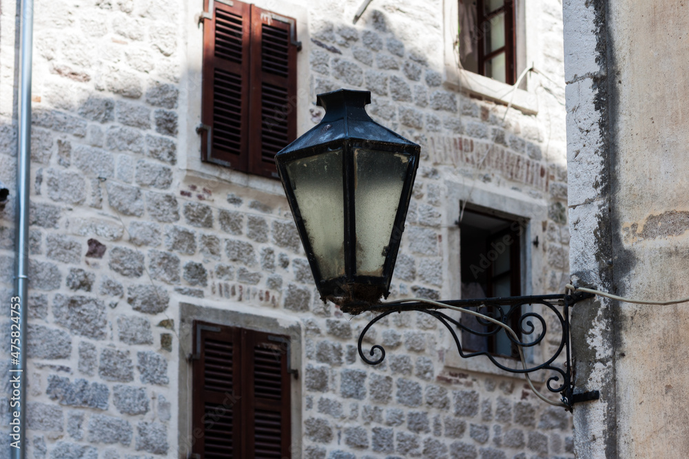 Ancient street, historical building in the old town of Kotor, Montenegro, Europe, Adriatic sea and mountains