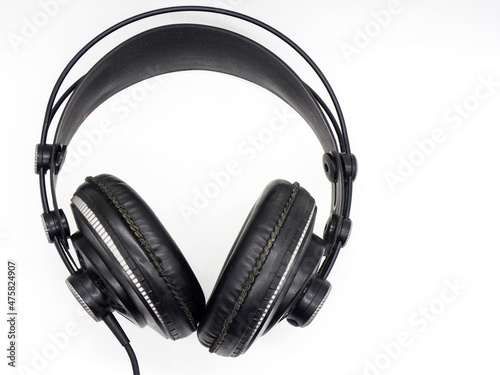 black professional studio monitor headphones isolated on white background