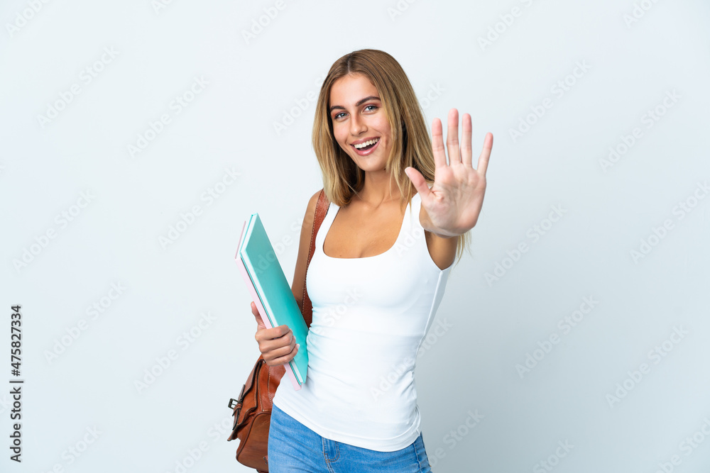 Young student woman isolated on white background counting five with fingers Young student woman isolated on white background counting five with fingers