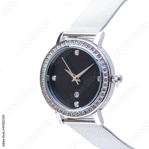 Wrist watch is stainless steel on white background.