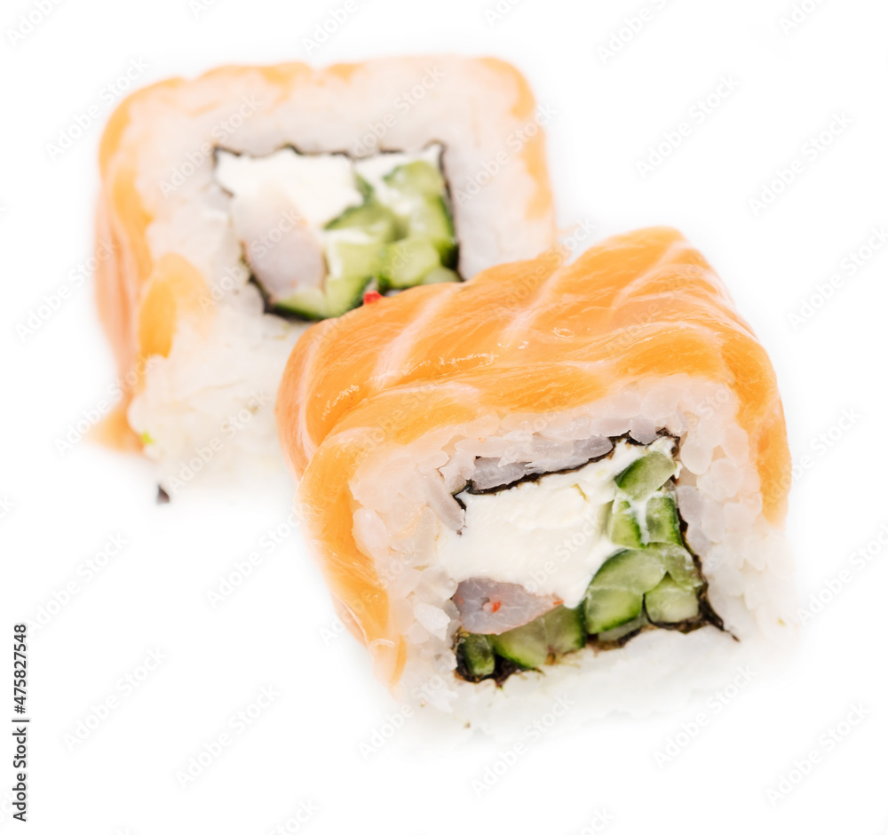 Sushi with salmon and cucumber on a white plate. Sushi with salmon and cucumber on a white plate.