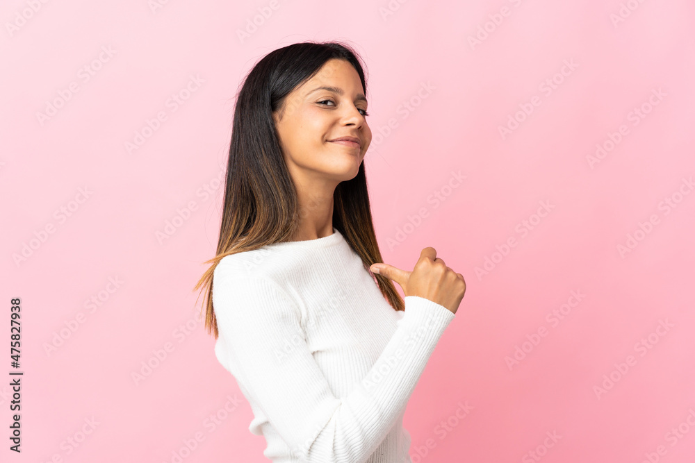 Caucasian girl isolated on pink background proud and self-satisfied Caucasian girl isolated on pink background proud and self-satisfied