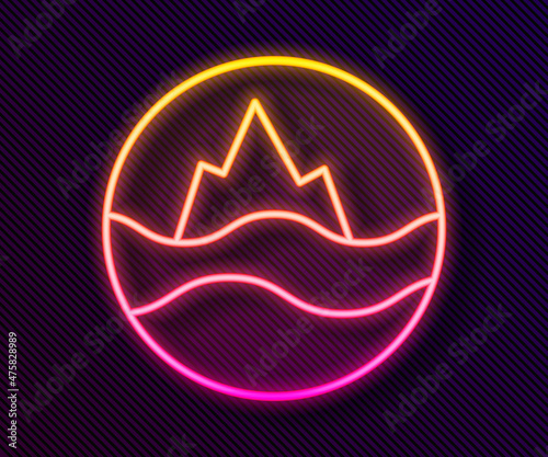 Glowing neon line Sea and waves icon isolated on black background. Vector