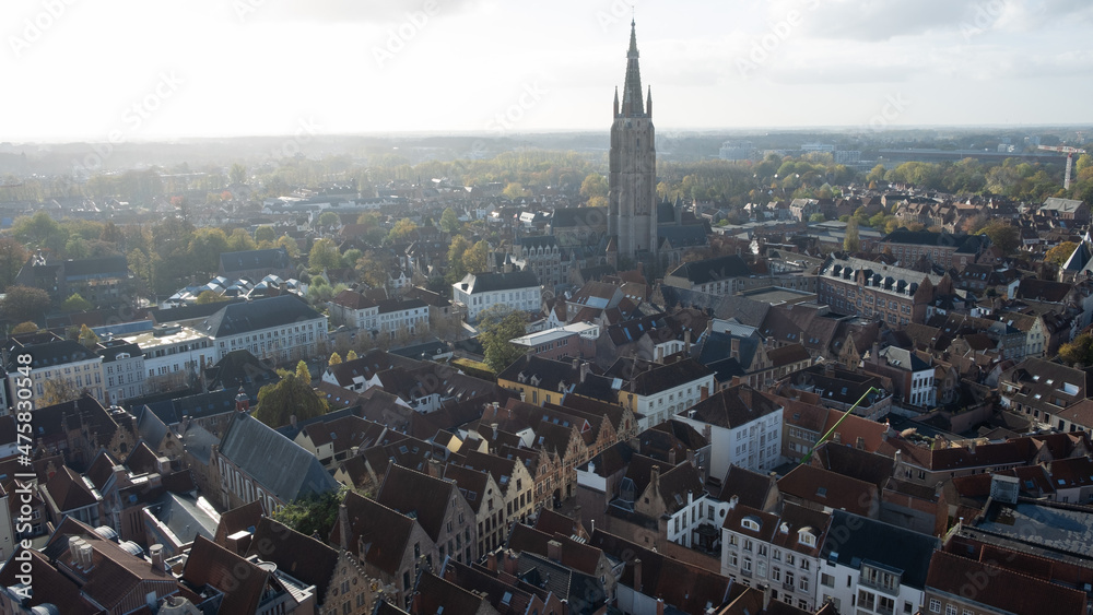 scenic view and cityscape of Bruges witth the churcher spear