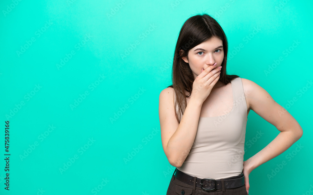 Young Russian woman isolated on green background surprised and shocked while looking right Young Russian woman isolated on green background surprised and shocked while looking right