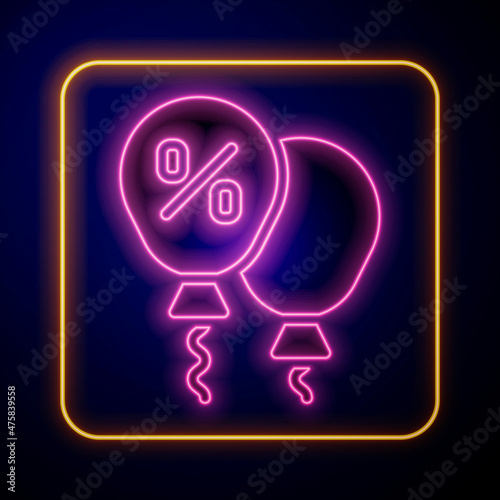 Glowing neon Discount percent tag icon isolated on black background. Shopping tag sign. Special offer sign. Discount coupons symbol. Vector