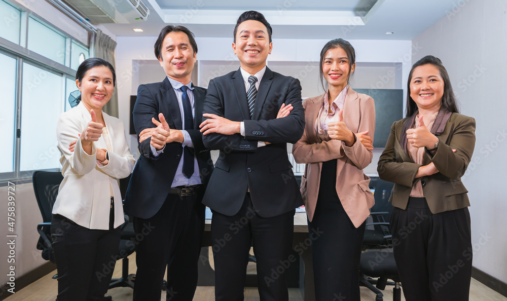 men and women happy standing together with thumbs upbusiness team discussion in corporate meeting men and women happy standing together with thumbs upbusiness team discussion in corporate meeting