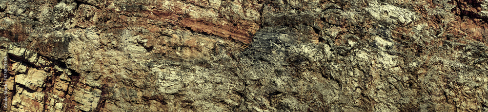 Grungy cragged bumpy pitted cavity stone facade, split layer gap.Ruined cracked shattered worn rough hiking canyon.Old ragged grunge steep marble cliff. Grand vintage crannied damaged impressive gorge Grungy cragged bumpy pitted cavity stone facade, split layer gap.Ruined cracked shattered worn rough hiking canyon.Old ragged grunge steep marble cliff. Grand vintage crannied damaged impressive gorge
