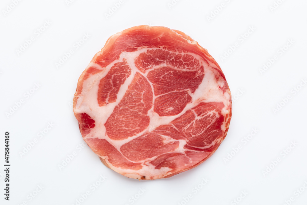 Italian prosciutto crudo or jamon. Raw ham. Isolated on white background. Italian prosciutto crudo or jamon. Raw ham. Isolated on white background.