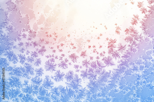 Frozen glass. Abstract winter ice pattern on frozen window.