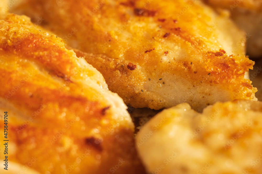 fried chicken breast fillet flour covered closeup