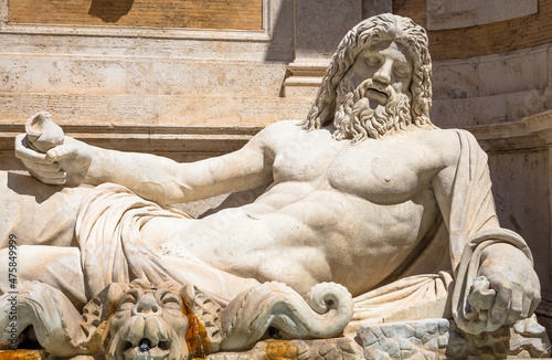 Famous Greek sculpture of Ocean god, named Marforio, located in Rome, Italy. Classic mythology in art. photo