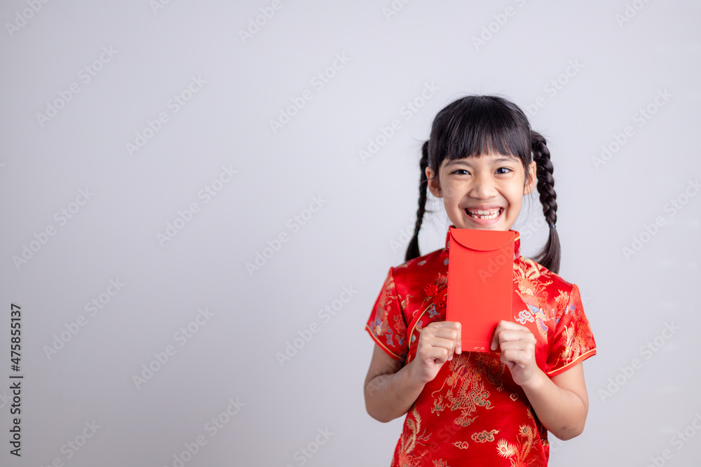 happy Chinese new year. smiling Asian little girls holding red envelope happy Chinese new year. smiling Asian little girls holding red envelope