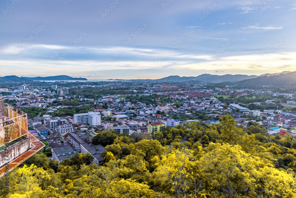 Panoramic view old phuket town viewed from Khaorang Hill and in the distance is Challong Bay and the islands big Buddha and Rawai Phuket Thailand