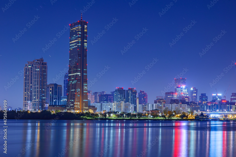Naklejka premium Cityscape night view of Yeouido, Seoul at sunset time