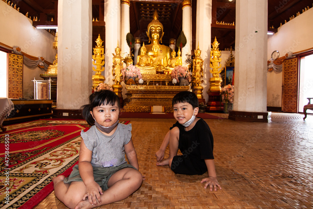 Two kids in the temple