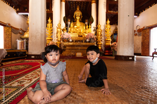 Two kids in the temple