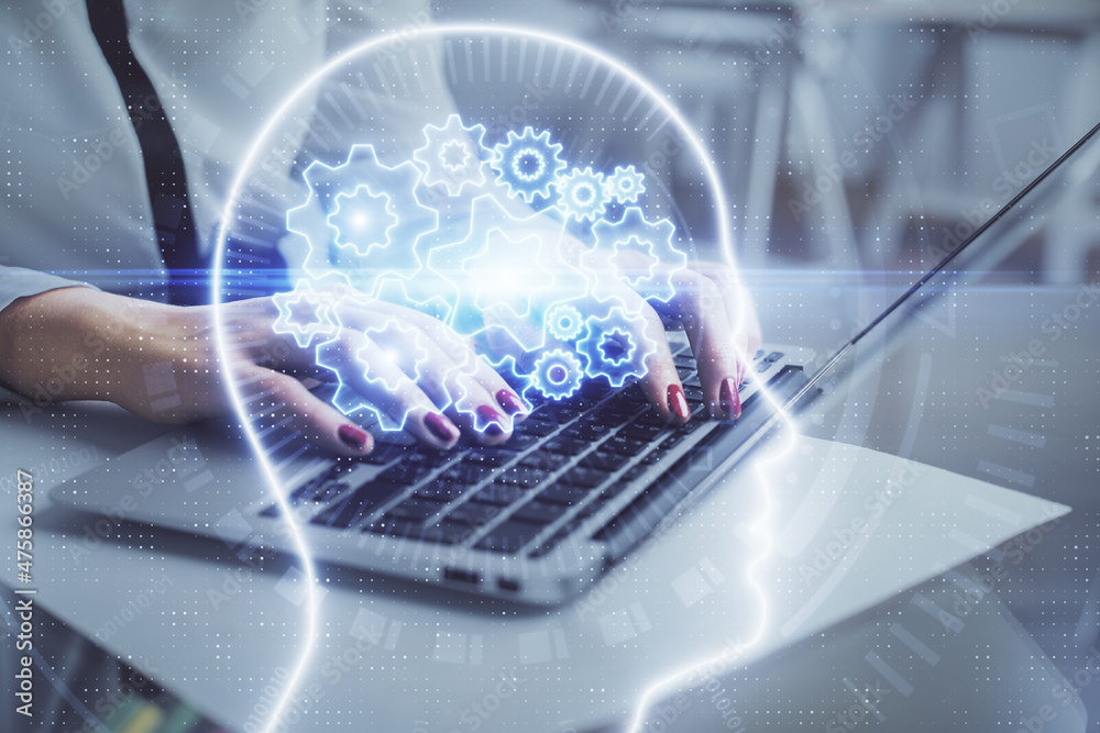 Multi exposure of woman hands working on computer and human brain hologram drawing. Ai tech concept.