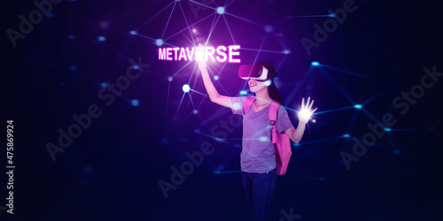 Female student touch metaverse word in cyberspace