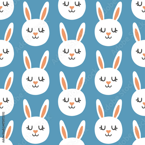 cute children s print with the faces of gray rabbits on a blue background. cute vector seamless pattern. bunny  hare