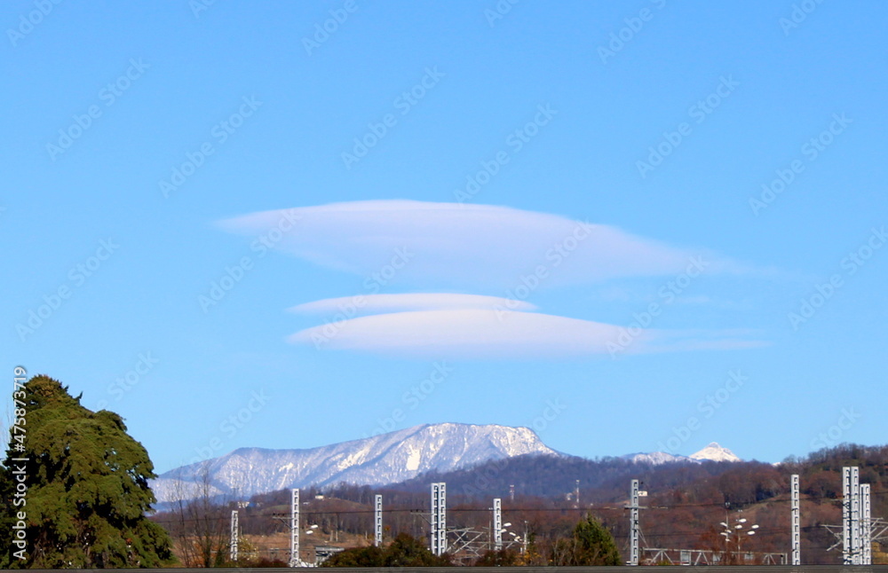 Clouds of interesting shape over the Caucasus mountains. Clouds of interesting shape over the Caucasus mountains.