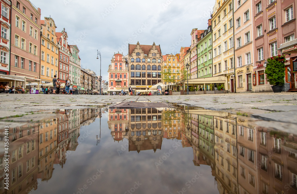 Wroclaw, Poland - due to the frequent rain, in Wroclaw you can easely find water pools, and use them to make nice shots. Here in particular the mirror effect in the Old Town