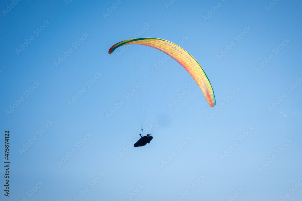paragliding flight in the mountains. Le Grand-Bornand, France paragliding flight in the mountains. Le Grand-Bornand, France