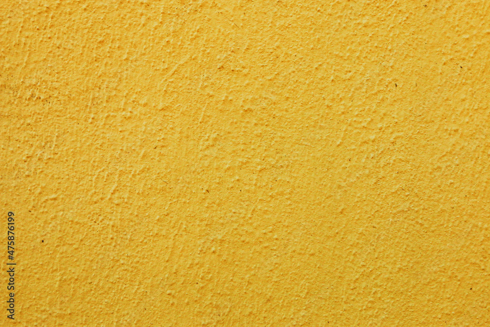 Abstract background of old worn yellow plaster on wall. Abstract background of old worn yellow plaster on wall.
