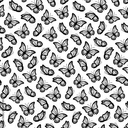 Seamless pattern of butterflies with monarch wings isolated on a white background. Butterfly seamless pattern is great for print gift paper, wedding greeting cards and fabrics