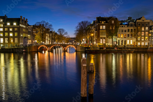 City scenic from Amsterdam at the river Amstel in the Netherlands at sunset © Nataraj