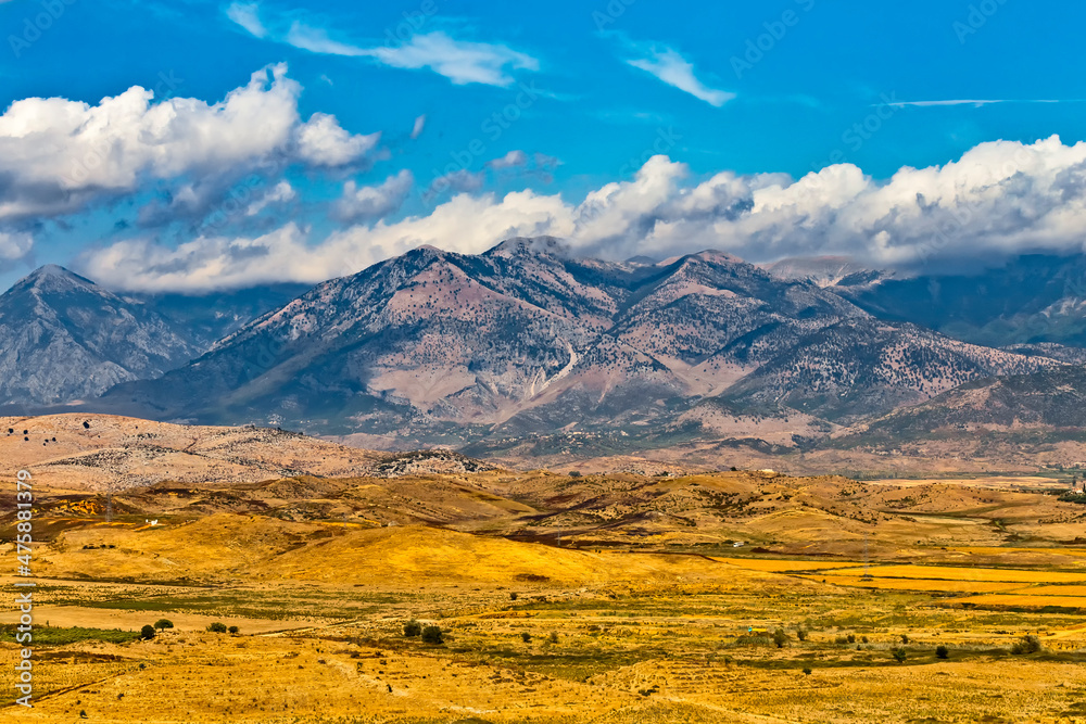 Autumn landscape panoramic view of Balkan Albanian Mountains close to the Saranda on sunny day. Saranda, Albania.