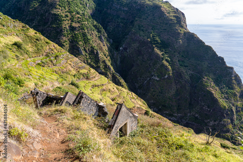 The abandoned house in the mountains near the ocean The abandoned house in the mountains near the ocean