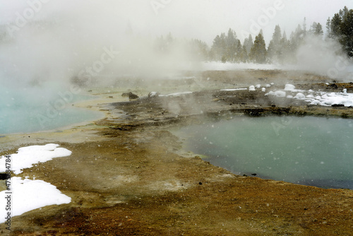 Winter Snowing Geothermal Pool Yellowstone