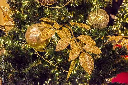 golden christmas decoration balls on christmas tree