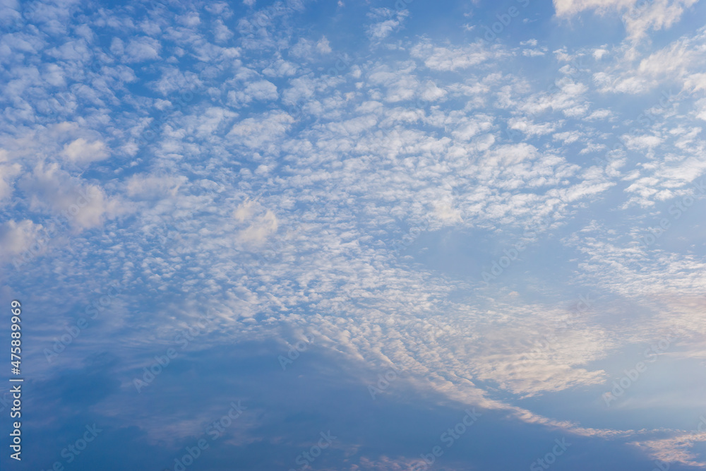 Beautiful view of sky with clouds at sunrise. Partly cloudy. Colorful sunset. Natural blue sky background texture, beautiful color. Beautiful view of sky with clouds at sunrise. Partly cloudy. Colorful sunset. Natural blue sky background texture, beautiful color.
