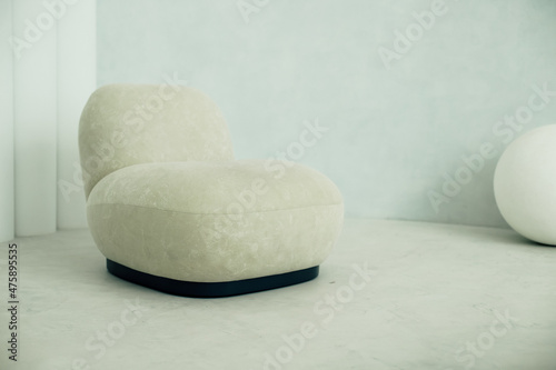 An original design armchair in a modern interior.