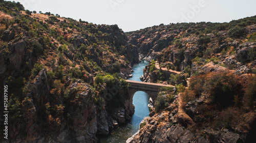 bridge between two cliffs  Sierra de Madrid  Buitrago del Lozoya  Spain 