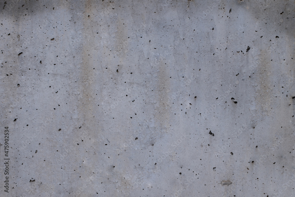 texture of pierced cement with different grey tones texture of pierced cement with different grey tones