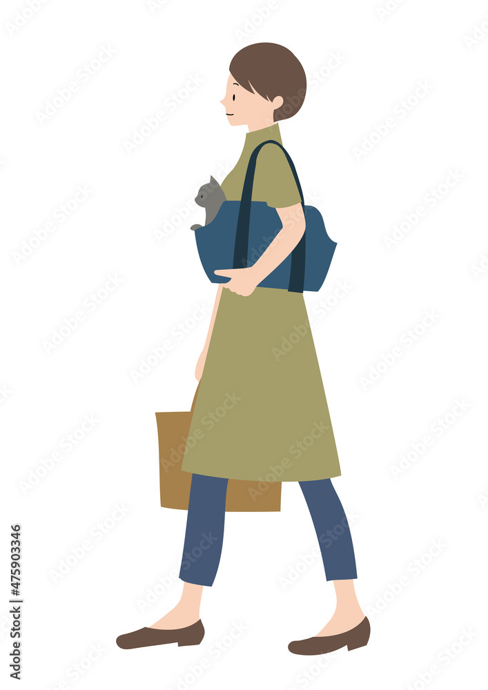 犬をキャリーバッグに入れて運ぶ女性（動物病院・災害避難・ペット旅行のイメージに）