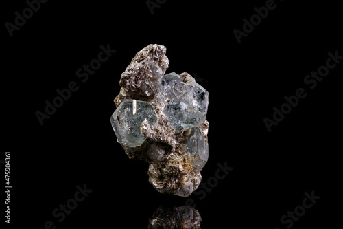 macro stone mineral aquamarine on a black background