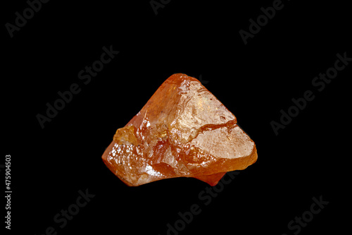 macro mineral stone Scheelite on a black background photo