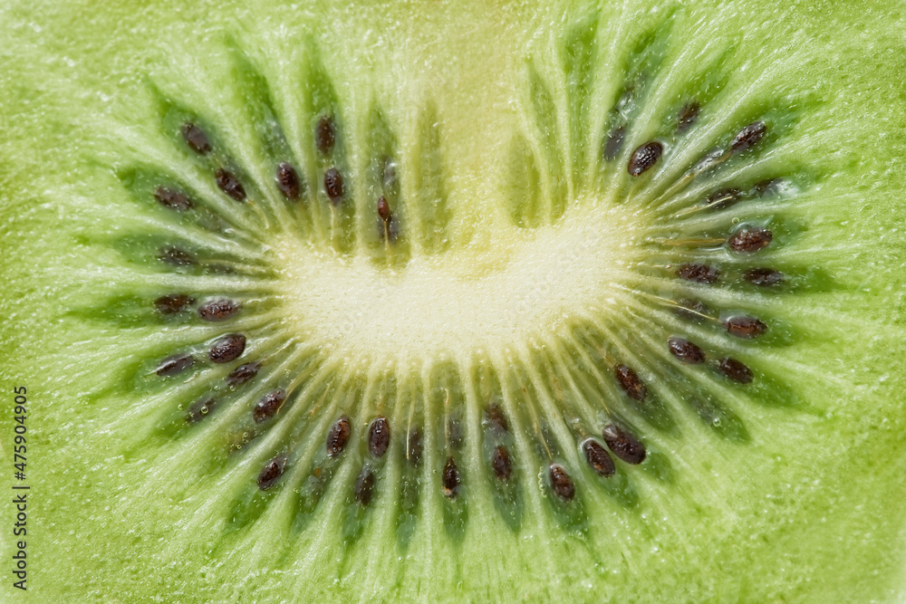 Close up macro green texture view on Kiwi Close up macro green texture view on Kiwi