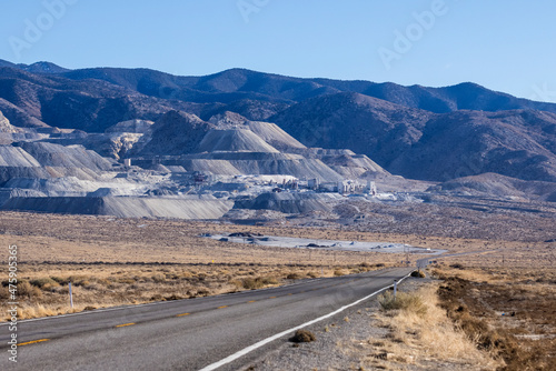 Road leading towards mining operation on a mountain in gabbs nevada. photo