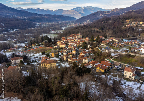 Aerial view of small Italian village Ferrera di Varese at winter time, situated in province of Varese, Lombardy, Italy © EleSi