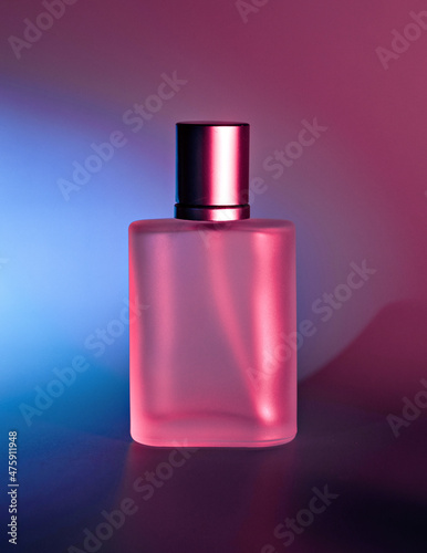 flacon of essence perfume minimal style concept. unbranded glass transparent perfume bottle for your text and design