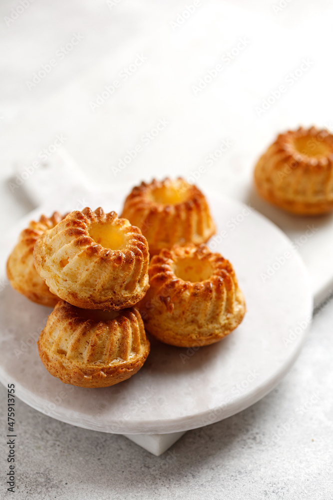 Muffins cake with oranges on white boards and table Muffins cake with oranges on white boards and table